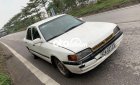 Mazda 323 1994 - Xe Mazda 323 2.0MT sản xuất năm 1994, màu trắng, xe nhập
