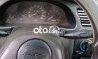 Daewoo Lanos  MT 2002 - Bán ô tô Daewoo Lanos MT năm sản xuất 2002, màu đen