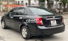 Chevrolet Lacetti   1.6MT 2011 - Bán Chevrolet Lacetti 1.6MT sản xuất 2011, màu đen, giá tốt