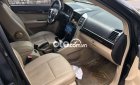 Chevrolet Captiva   LT  2006 - Cần bán gấp Chevrolet Captiva LT sản xuất năm 2006, màu đen