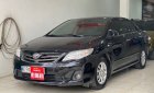 Toyota Corolla 2011 - Cần bán gấp Toyota Corolla sản xuất năm 2011, màu đen, xe nhập