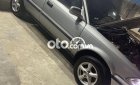 Toyota Corolla     1998 - Cần bán gấp Toyota Corolla sản xuất 1998, màu đen, xe nhập, giá tốt