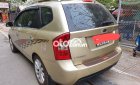 Kia Carens 2012 - Bán ô tô Kia Carens sản xuất 2012, màu vàng