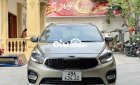 Kia Rondo 2017 - Cần bán xe Kia Rondo năm 2017, màu vàng cát