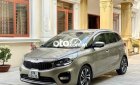 Kia Rondo 2017 - Cần bán xe Kia Rondo năm 2017, màu vàng cát