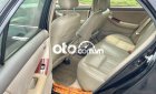 Toyota Corolla 2006 - Bán xe Toyota Corolla năm sản xuất 2006, màu đen, nhập khẩu, giá tốt