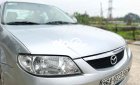 Mazda 323 2004 - Cần bán gấp Mazda 323 năm sản xuất 2004, màu bạc, xe nhập giá cạnh tranh