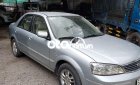 Ford Laser 2004 - Bán ô tô Ford Laser LXI năm 2004, màu bạc số sàn