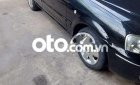 Ford Laser 2003 - Cần bán Ford Laser 1.8 năm 2003, màu đen, 129tr