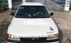 Mazda 323 1995 - Bán Mazda 323 năm 1995, màu trắng, nhập khẩu