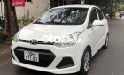 Hyundai Grand i10 2016 - Bán ô tô Hyundai Grand i10 MT năm 2016, màu trắng, xe nhập chính chủ