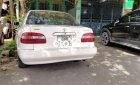 Toyota Corolla 1998 - Bán Toyota Corolla MT sản xuất năm 1998, màu kem (be), giá tốt