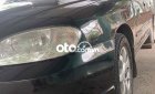 Kia Spectra 2004 - Cần bán gấp Kia Spectra năm sản xuất 2004, màu đen, nhập khẩu, giá 82tr