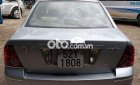 Ford Laser 2004 - Bán ô tô Ford Laser LXI năm 2004, màu bạc số sàn