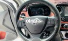 Hyundai Grand i10 2020 - Bán Hyundai Grand i10 1.2AT sản xuất 2020, màu trắng số tự động, 388tr