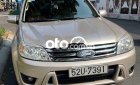 Ford Escape 2009 - Cần bán lại xe Ford Escape XLT 4x4 2009, màu vàng