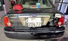 Ford Laser 2002 - Cần bán xe Ford Laser sản xuất 2002, màu đen xe gia đình, giá 110tr