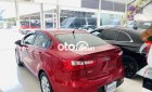 Kia Rio 2015 - Cần bán gấp Kia Rio 1.4AT sản xuất 2015, màu đỏ, xe nhập như mới