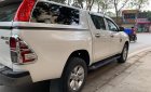 Toyota Hilux 2018 - Cần bán lại xe Toyota Hilux 2.4E năm 2018, màu trắng, xe nhập số tự động