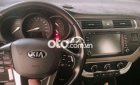 Kia Rio 2015 - Cần bán xe Kia Rio 1.4 AT sản xuất năm 2015, màu đen, nhập khẩu số tự động