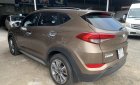 Cần bán Hyundai Tucson Xăng đời 2017, màu vàng