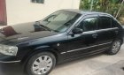 Ford Laser 2004 - Màu đen số tự động