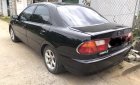 Mazda 323 2000 - Màu đen