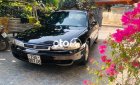 Mazda 626 1994 - Màu đen, giá 48tr