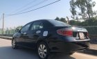 Toyota Vios 2006 - Xe màu đen số sàn  