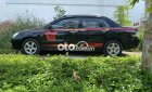 Mitsubishi Lancer 2004 - Màu đen xe gia đình