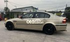 BMW 318i 2002 - Bán xe BMW 318i sản xuất năm 2002, màu vàng