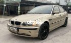 BMW 318i 2002 - Bán xe BMW 318i sản xuất năm 2002, màu vàng