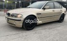 BMW 318i 2002 - Bán xe BMW 318i sản xuất năm 2002, màu vàng