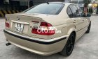 BMW 318i 2002 - Bán xe BMW 318i sản xuất năm 2002, màu vàng