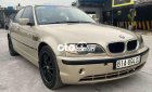 BMW 318i 2002 - Bán xe BMW 318i sản xuất năm 2002, màu vàng