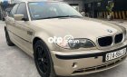 BMW 318i 2002 - Bán xe BMW 318i sản xuất năm 2002, màu vàng