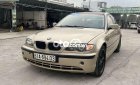 BMW 318i 2002 - Bán xe BMW 318i sản xuất năm 2002, màu vàng