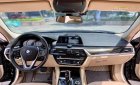 BMW 520i 2018 - Cần bán gấp xe đen nội thất kem