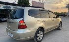 Nissan Grand livina 2012 - Màu bạc chính chủ