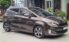 Kia Rondo 2015 - Số tự động, màu nâu, odo 77000km, biển TPHCM. Tặng 100% lệ phí trước bạ