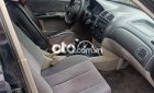 Mazda 323 Bán xe   màu đen, sx 2002. 2002 - Bán xe Mazda 323 màu đen, sx 2002.