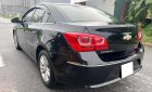 Chevrolet Cruze 2016 - Cần bán xe số sàn, màu đen còn mới ken