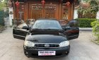 Kia Spectra 2005 - Màu đen, giá 77tr