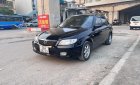 Mazda 323 2003 - Màu đen, giá 90tr