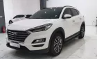 Hyundai Tucson 2.0 đặc biệt ATH 2020 - Cần bán Hyundai Tucson 2.0 đặc biệt ATH đời 2020, màu trắng, xe gia đình chạy chuẩn km