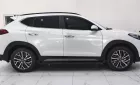 Hyundai Tucson 2.0 đặc biệt ATH 2020 - Cần bán Hyundai Tucson 2.0 đặc biệt ATH đời 2020, màu trắng, xe gia đình chạy chuẩn km