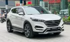 Hyundai Tucson 1.6 Turbo 2018 - Bán Hyundai Tucson 1.6 Turbo đời 2018, màu trắng, xe đẹp đi lại gia đình