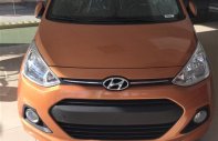 Hyundai i10 Grand 2015 - Bán xe Hyundai Grand i10 đời 2015, màu nâu vàng, nhập khẩu chính hãng giá 396 triệu tại Hà Nội