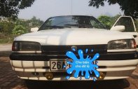 Mazda 323 1995 - Bán ô tô Mazda 323 đời 1995, màu trắng, 85 triệu giá 85 triệu tại Sơn La