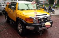 Toyota Fj cruiser AT 2007 - Cần bán gấp Toyota Fj cruiser AT đời 2007, màu vàng, nhập khẩu giá 1 tỷ 150 tr tại Hà Nội